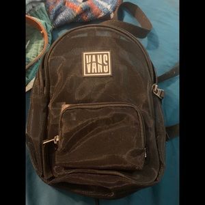 Black vans mini backpack adjustable straps can be worn crossbody or as backpack